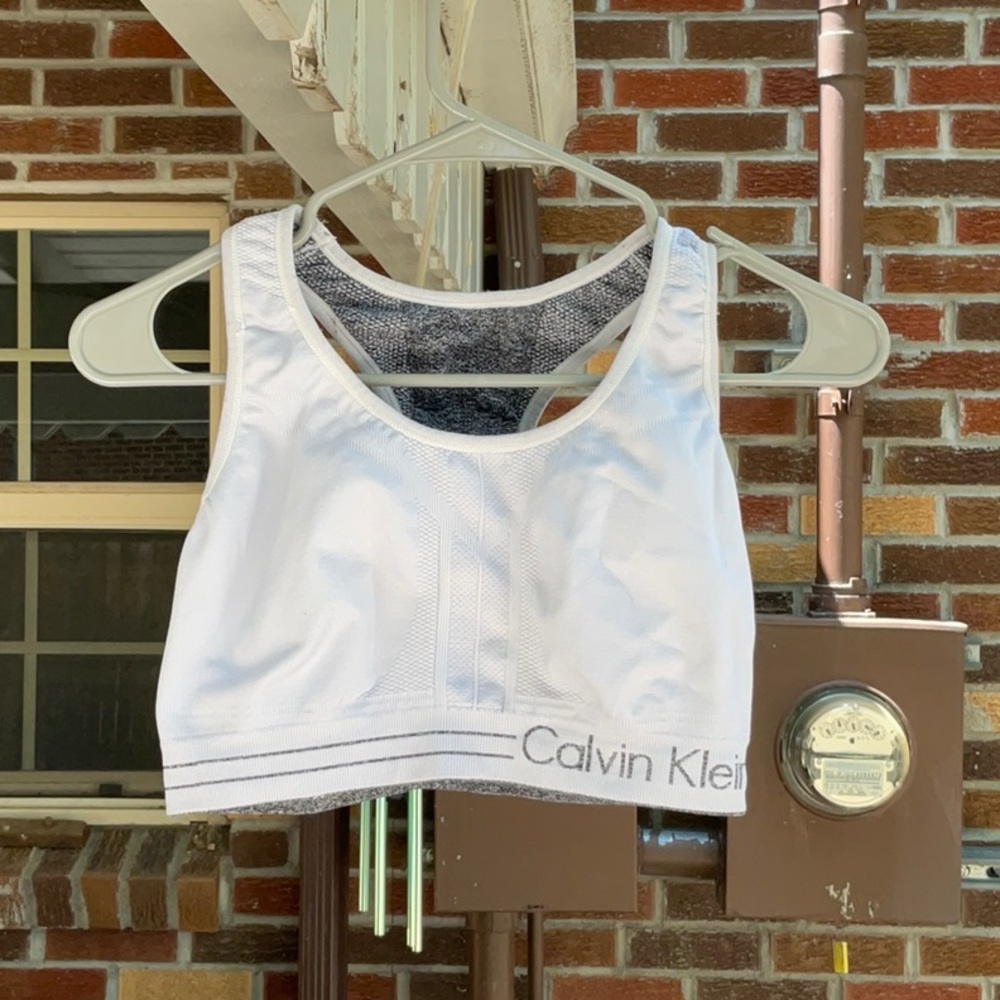 Grey and white reversible Calvin Klein sports bra